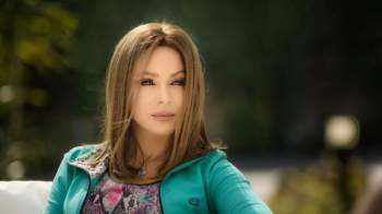 هذه ليست سوزان نجم الدين بل هي ممثلة مصرية شهيرة!!
