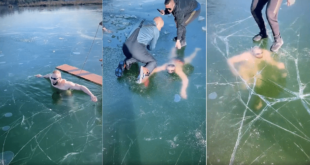 فيديو يقطع الأنفاس لسباح يعلق تحت الجليد في بحيرة متجمدة