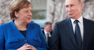 الغارديان: صفقة سرية بين بوتين وميركل أوصلتها للسلطة