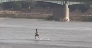 رجل يمشي على نهر دجلة ويصدم العراقيين