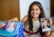 ميركل تفاجئ طفلة سورية لاجئة بهدية غير متوقعة في يومها الدراسي الأول